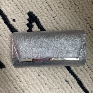 Metallic silver clutch purse